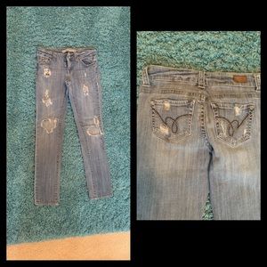 Distressed blue jeans. Side 3 good condition
